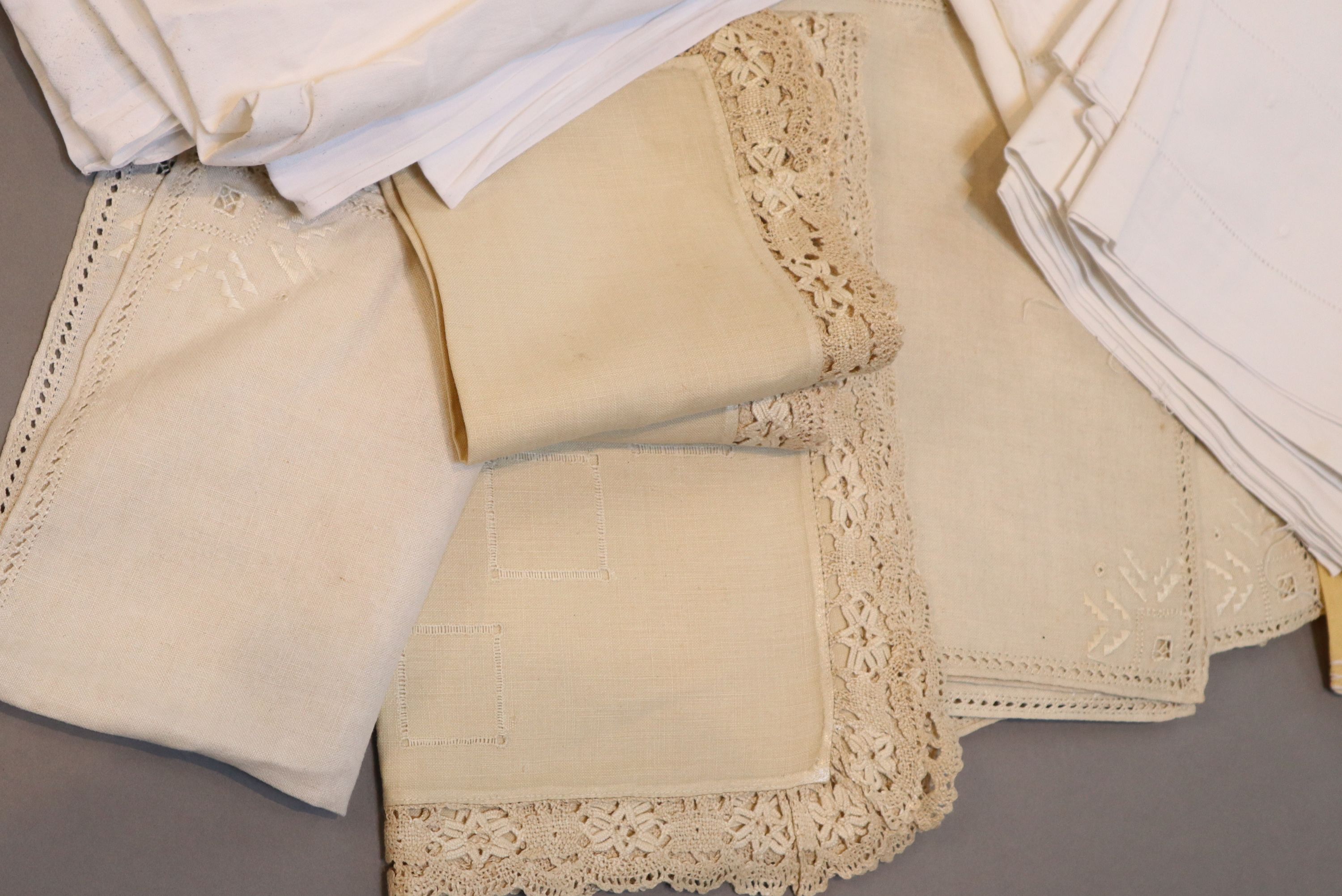 A quantity of linen sheets and embroidery